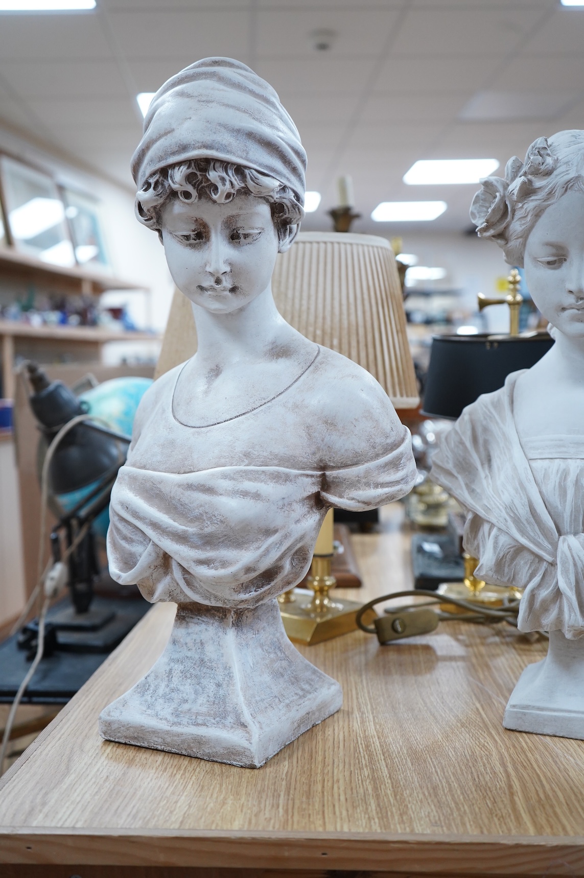 Two signed plaster busts, one after Gustave van Vaerenberg (1873 - 1927), the other after Rene Maquet (19th century), tallest 52cm